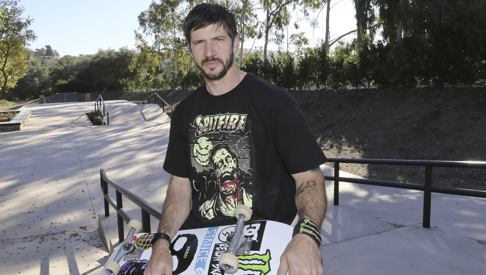 Chris Cole's drama. Sitting with skateboard